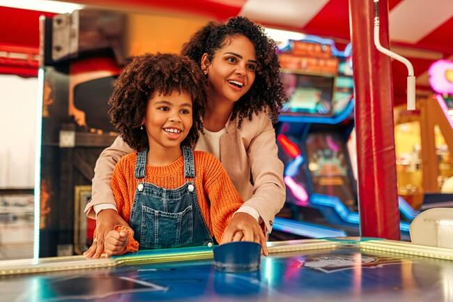 Family spending money at Family Entertainment Center
